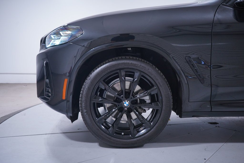 Certified Used 2024 Black Sapphire Metallic BMW sDrive30i image 2