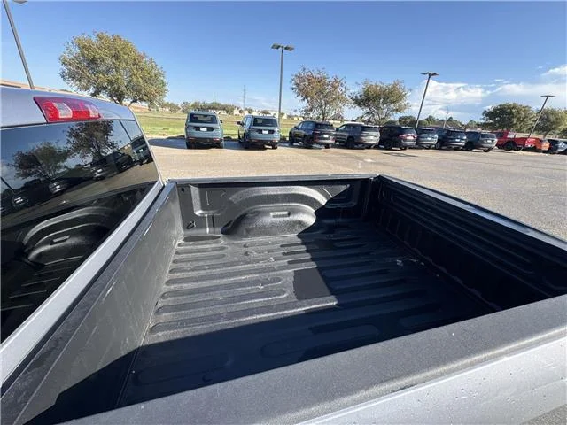 Used 2024 Granite Crystal Metallic Clearcoat RAM SLT 4x4 Quad Cab 6.3 ft. box 140 in. WB image 26