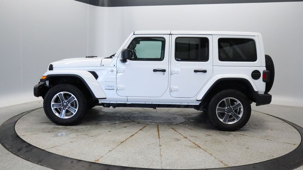 Used 2021 Jeep Wrangler Unlimited Sahara with VIN 1C4HJXEG0MW835243 for sale in Coon Rapids, Minnesota