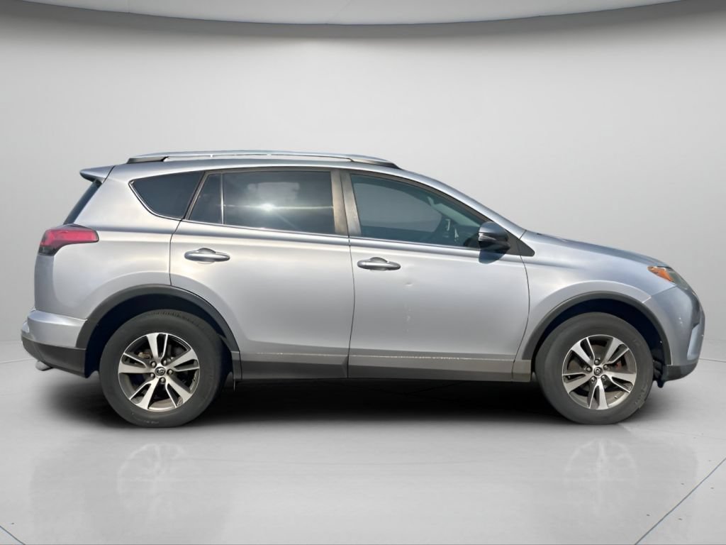 Used 2016 Silver Sky Metallic Toyota XLE image 4