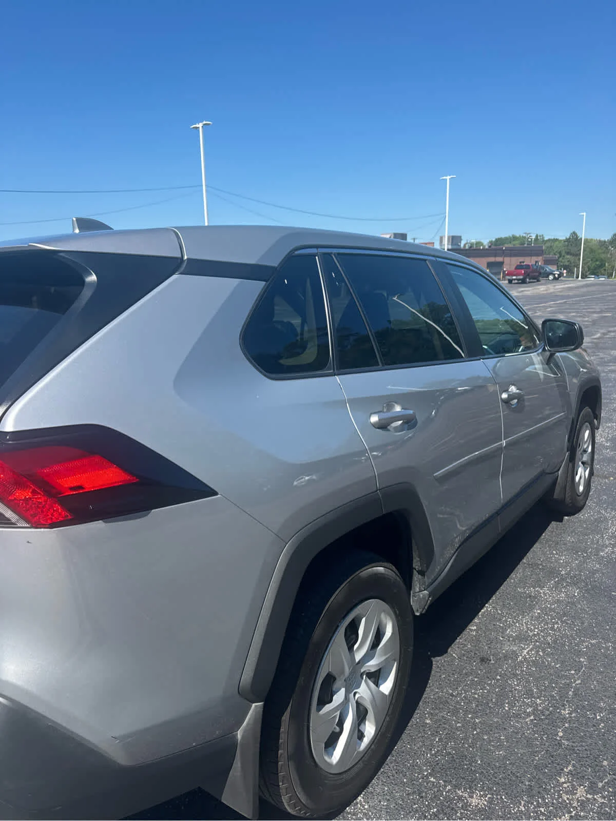 Used 2024 Silver Sky Metallic Toyota LE image 4