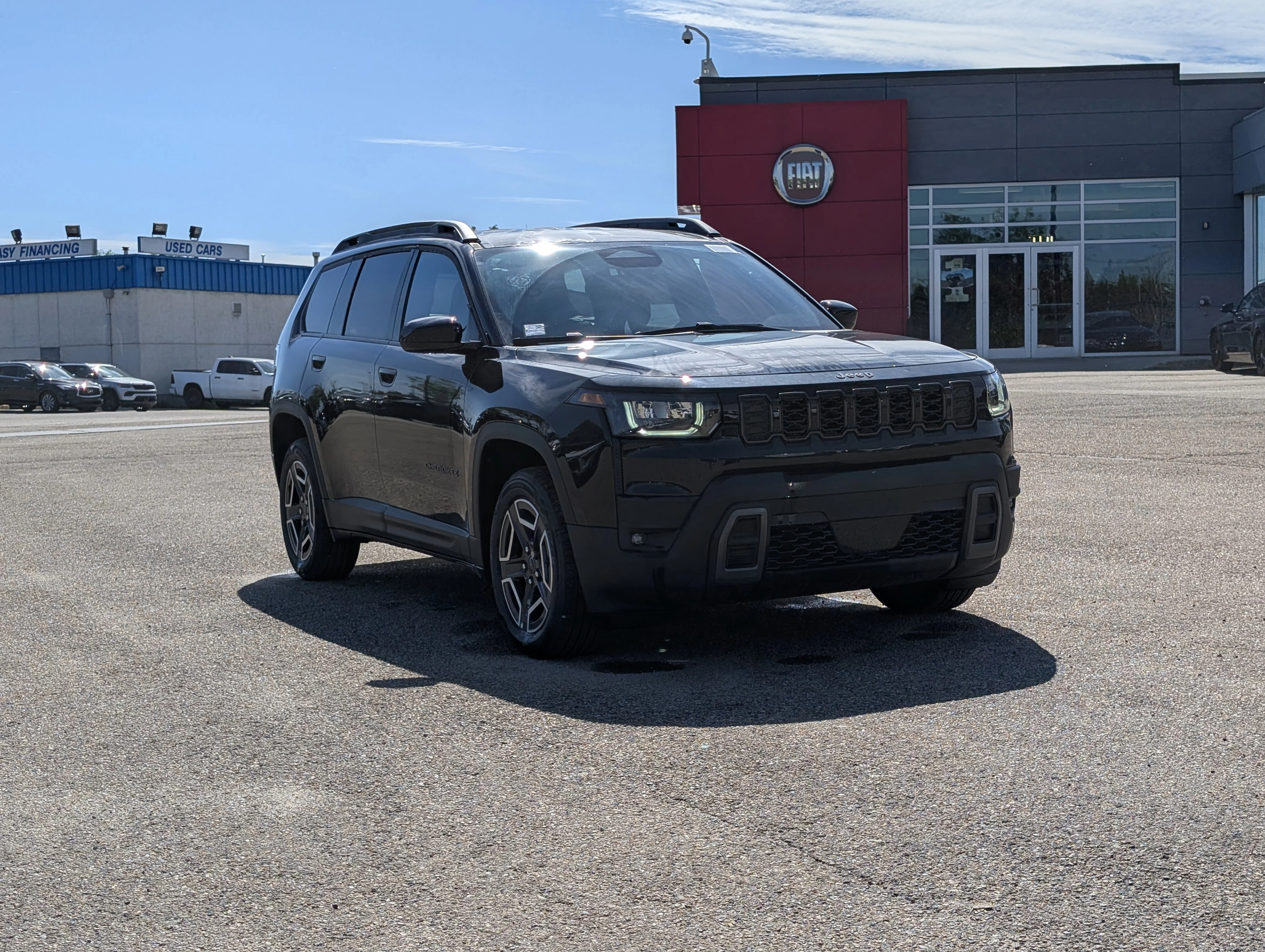 New 2026 Diamond Black Crystal Pearl Jeep Laredo image 9