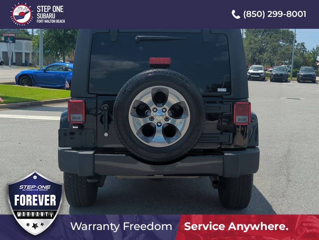 Used 2017 Black Jeep Unlimited Sahara image 6