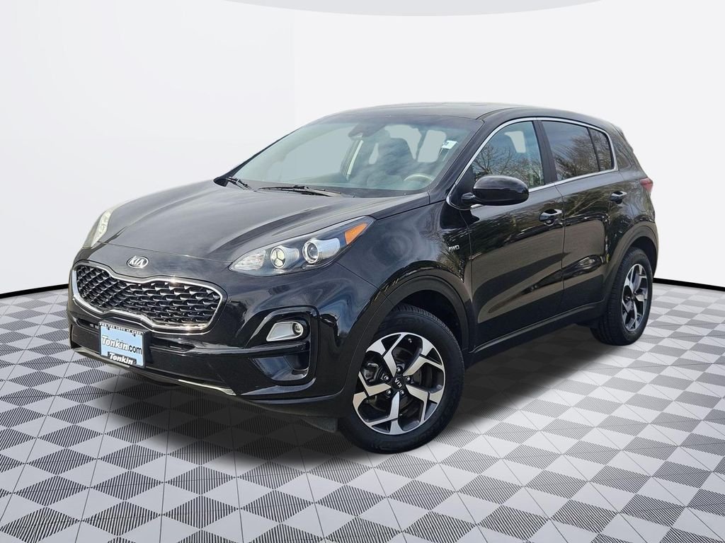 Used 2020 Black Cherry Pearl Kia LX image 1