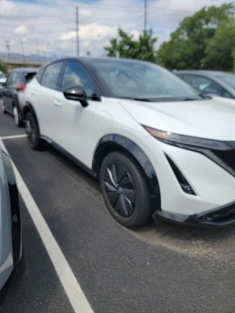 Used 2024 White Nissan EVOLVE+ e-4ORCE image 5