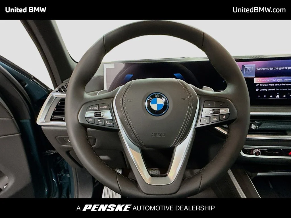 New 2026 Blue Ridge Mountain Metallic BMW xDrive50e image 6