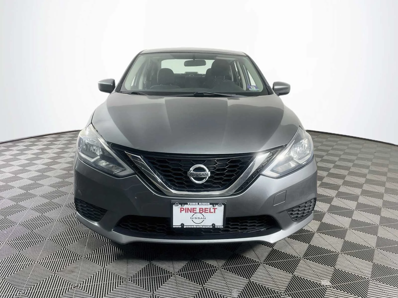 Used 2017 Gun Metallic Nissan S image 2