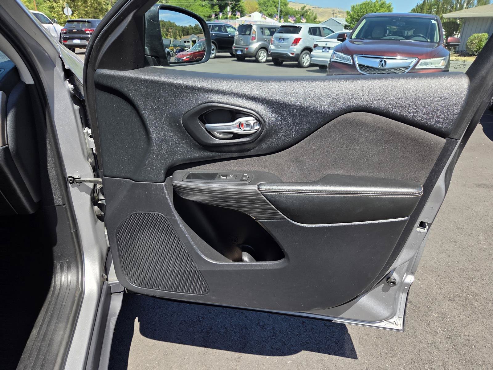 Used 2016 Billet Silver Metallic Clearcoat Jeep Sport image 22