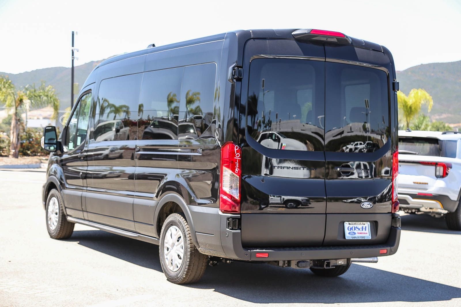New 2026 Agate Black Metallic Ford Passenger Van XLT image 6