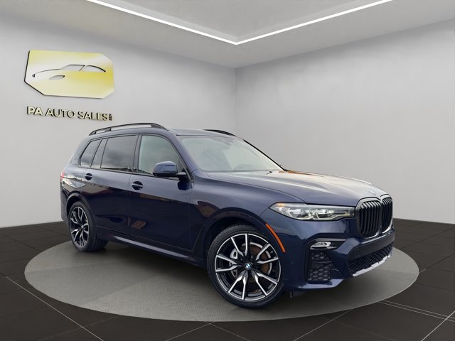 Used 2022 Tanzanite Blue II Metallic BMW xDrive40i image 1