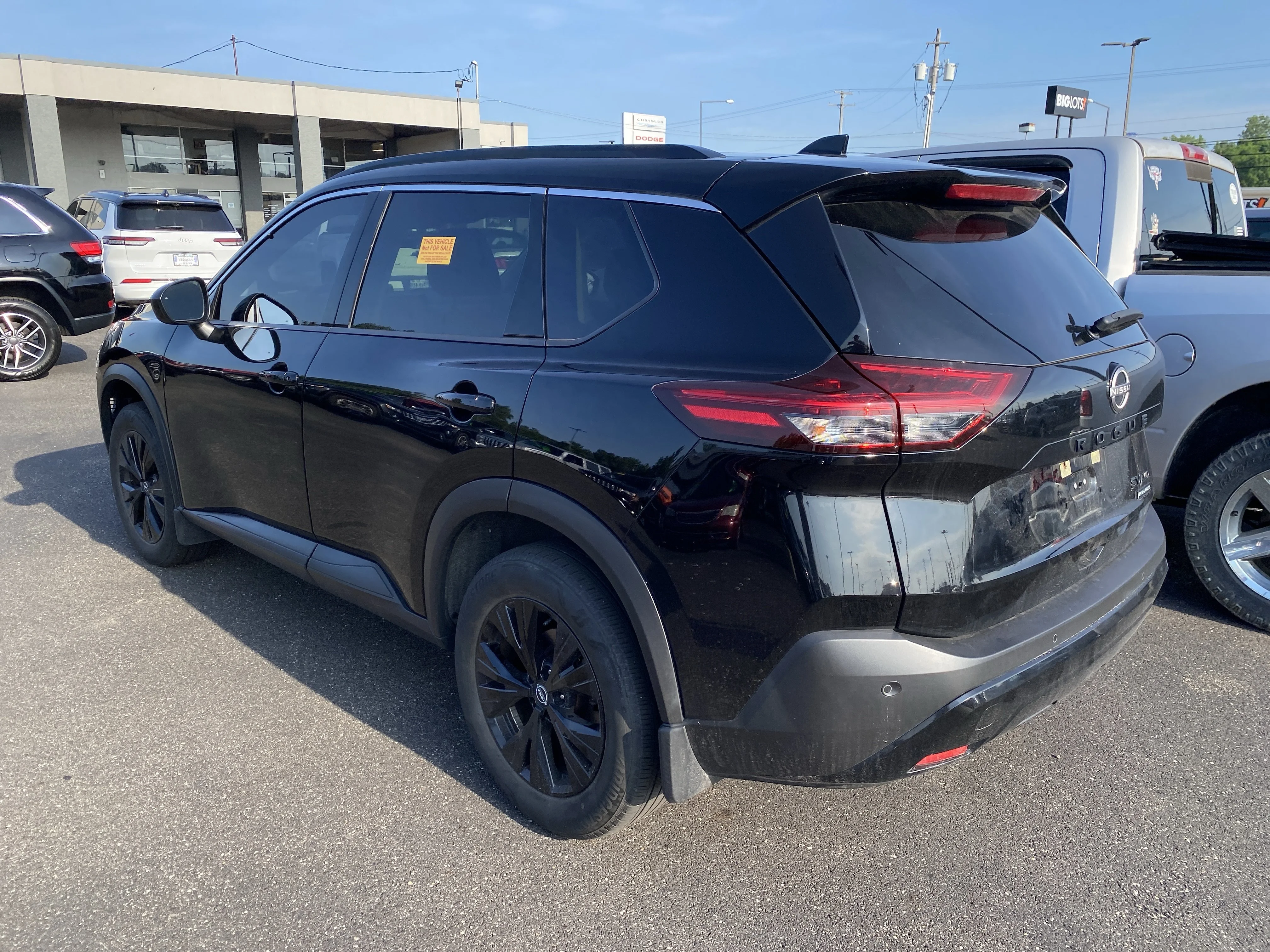 Used 2023 Super Black Nissan SV image 2
