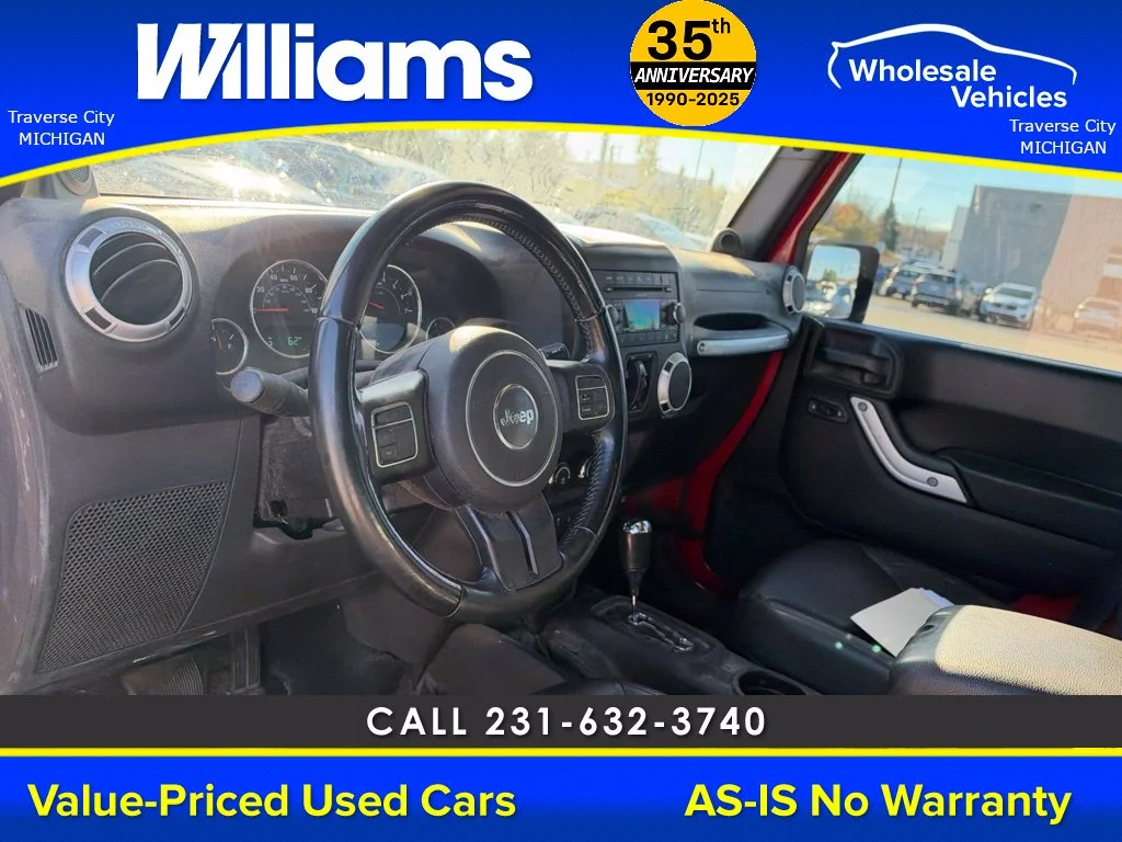 Used 2013 Flame Red Jeep Unlimited Sahara image 34