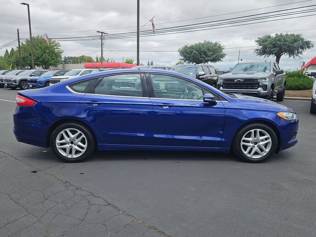 Used 2014 Blue Metallic Ford SE image 7