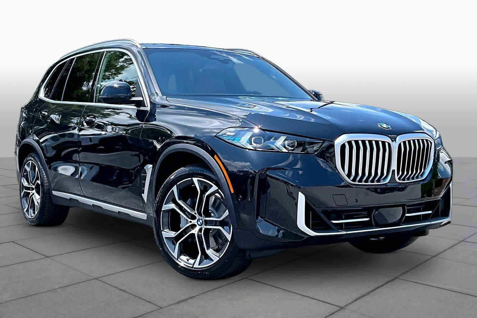 New 2026 Black Sapphire Metallic BMW sDrive40i image 2