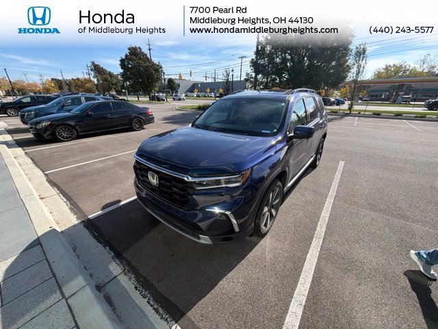 Certified Used 2025 Obsidian Blue Pearl Honda Touring image 1