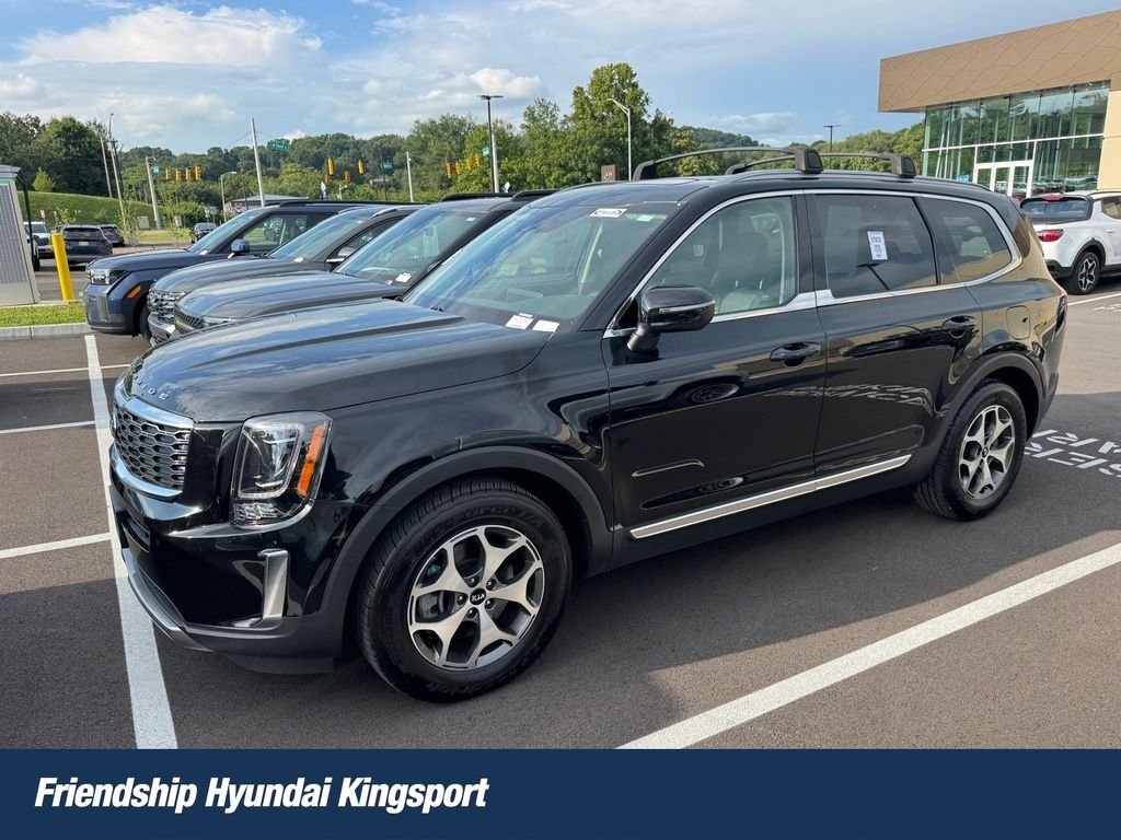 Used 2020 Black Kia EX image 1