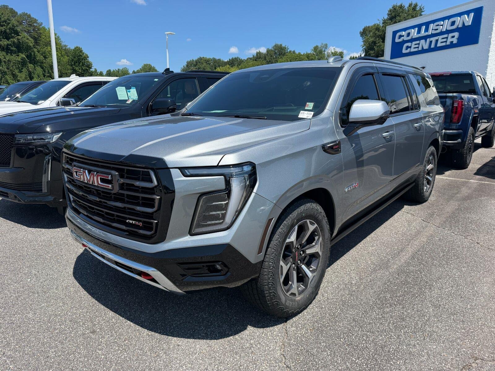 Used 2025 Sterling Metallic GMC AT4 Ultimate image 2