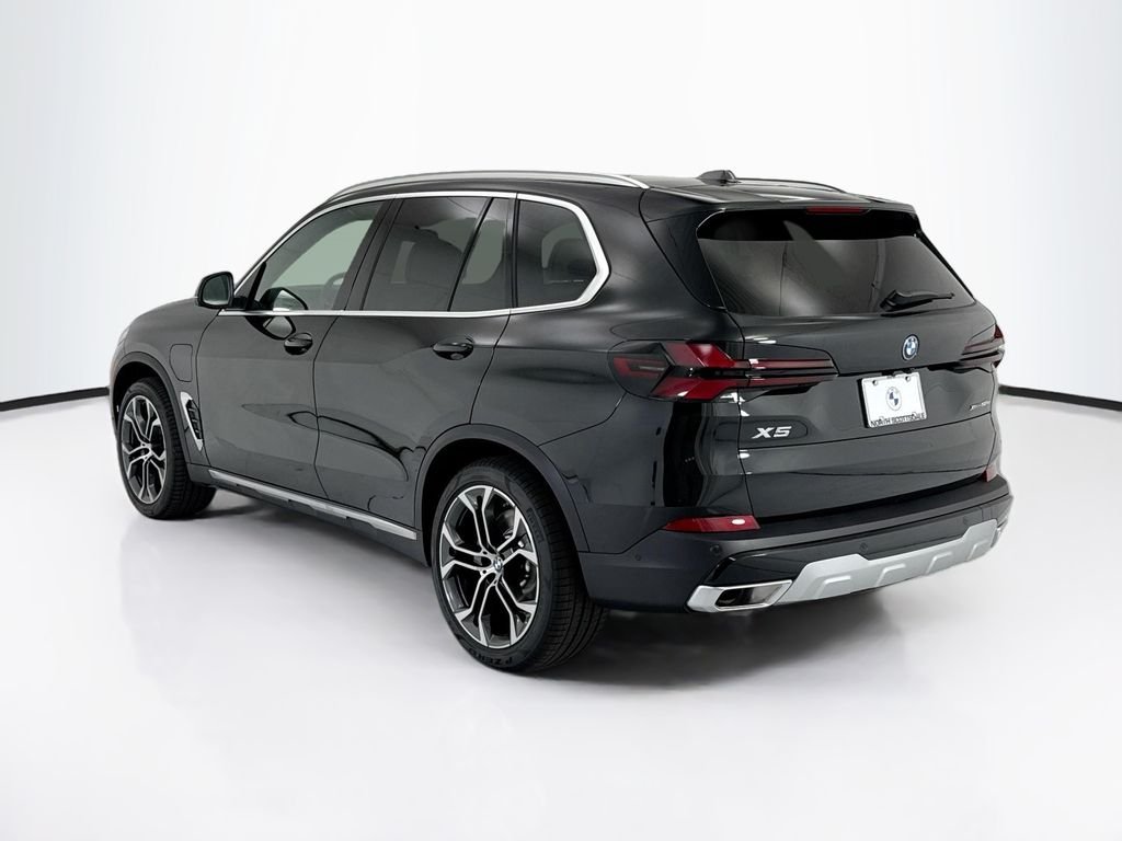 New 2026 Black Sapphire Metallic BMW xDrive50e image 7