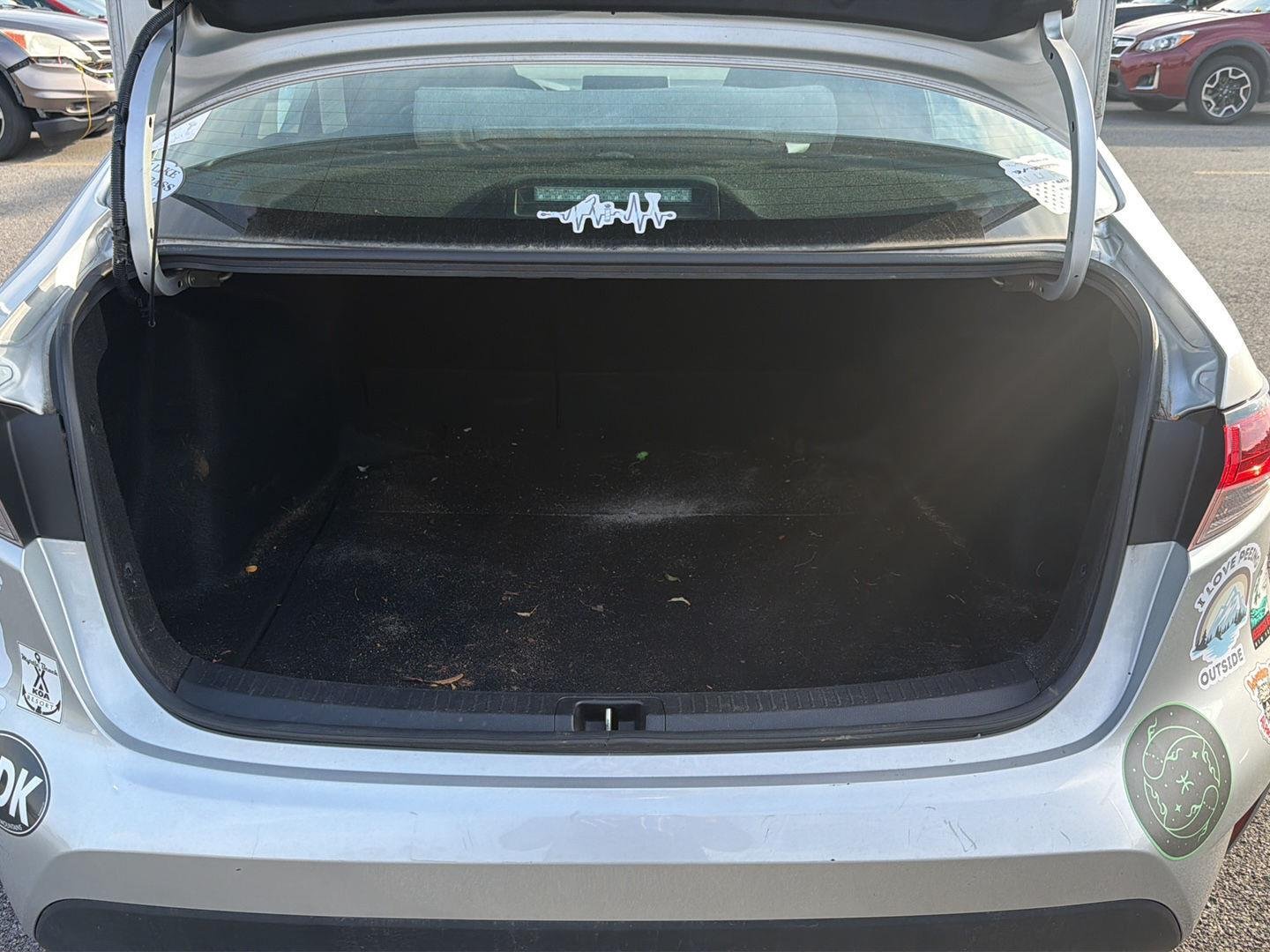 Used 2021 Classic Silver Metallic Toyota LE image 21