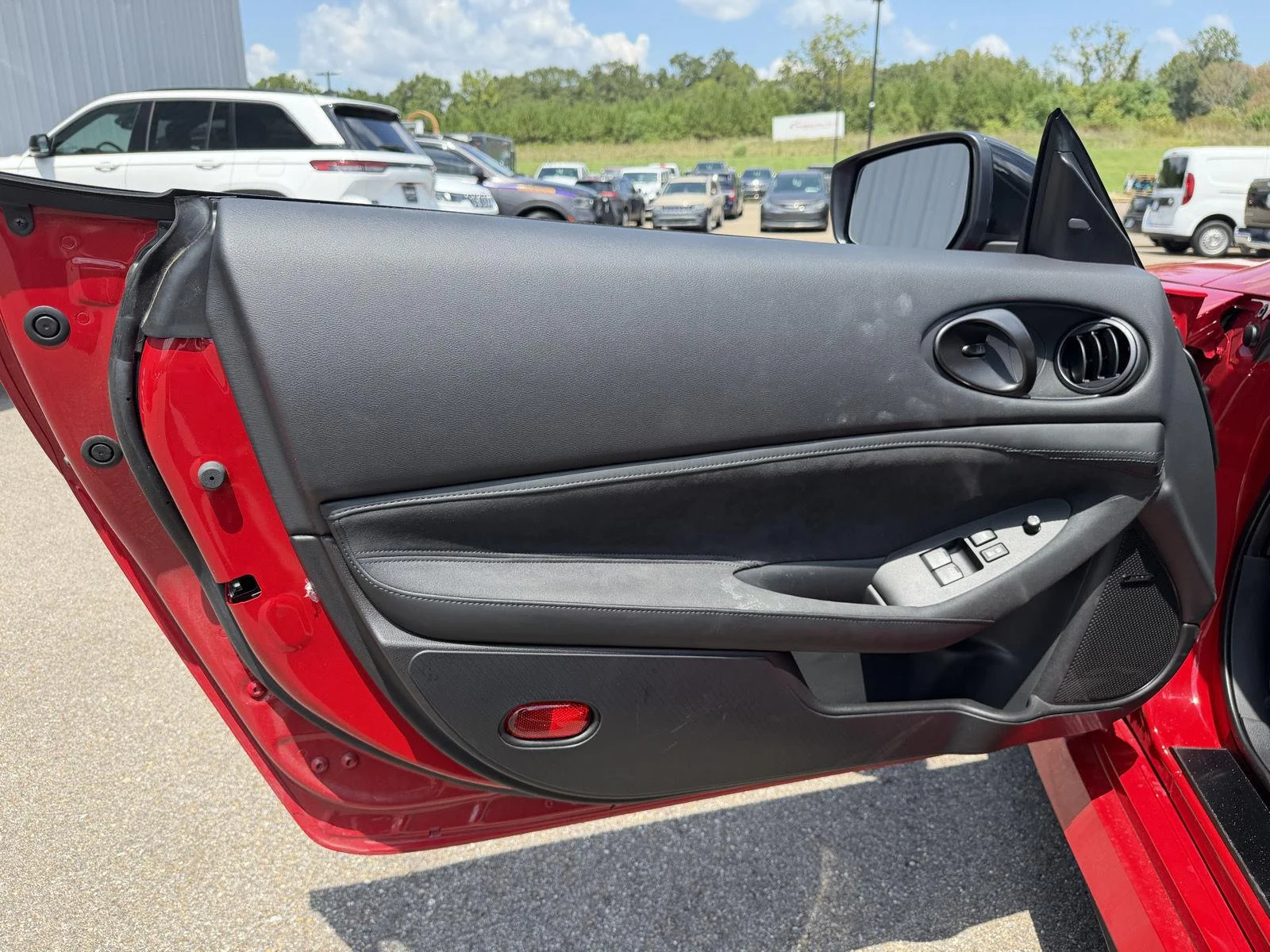 Used 2025 Solid Red/Super Black Nissan Performance image 15
