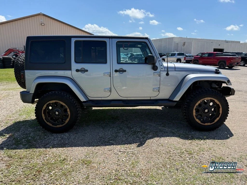Used 2016 Jeep Wrangler Unlimited Sahara with VIN 1C4BJWEG6GL259048 for sale in Spirit Lake, IA