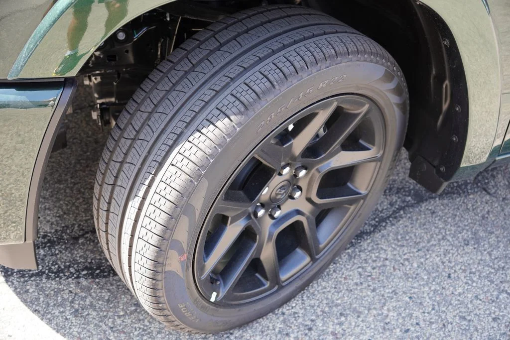 New 2027 Serrano-Green Metallic Exterior Paint RAM Laramie image 9
