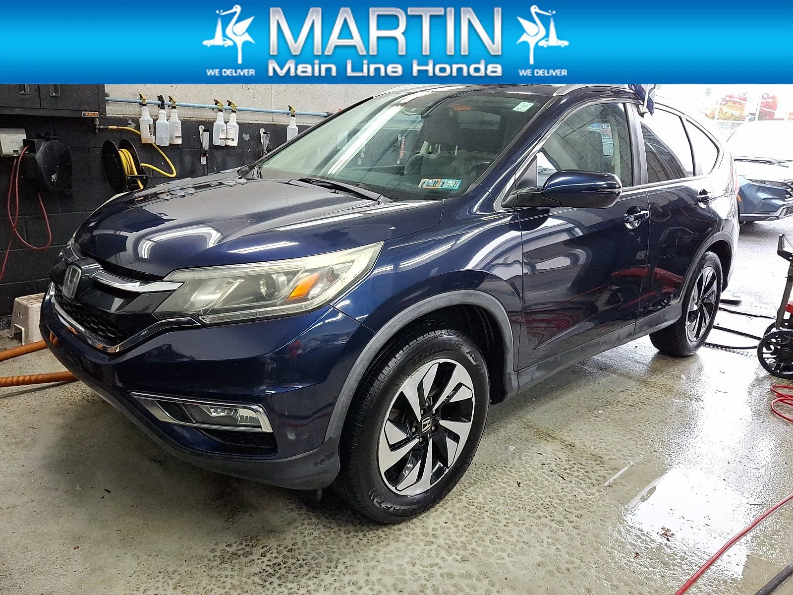 Used 2015 Obsidian Blue Pearl Honda Touring image 1