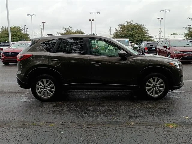 Used 2016 Titanium Flash Mica Mazda Touring image 2