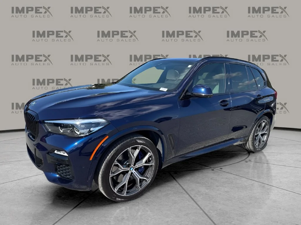 Used 2020 Blue BMW sDrive40i image 1
