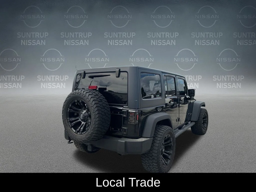 Used 2016 Black Jeep Unlimited Sport image 6