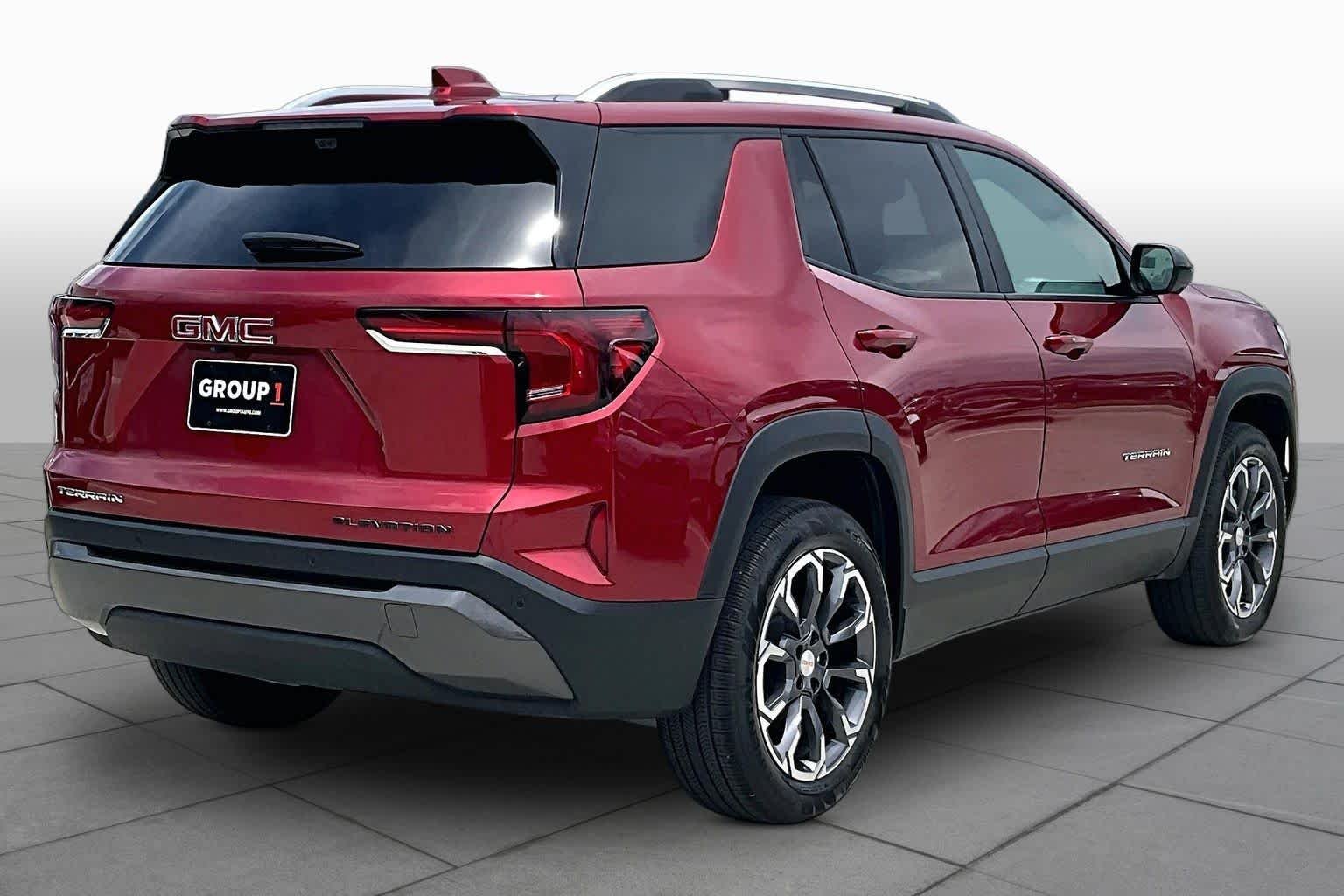Used 2026 Volcanic Red Tintcoat GMC FWD Elevation image 13
