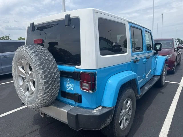 Used 2017 Blue Jeep Unlimited Sahara image 5
