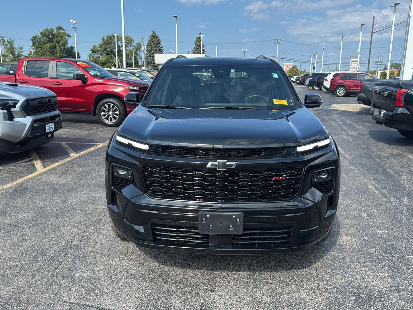 Used 2026 Mosaic Black Metallic Chevrolet AWD RS image 2