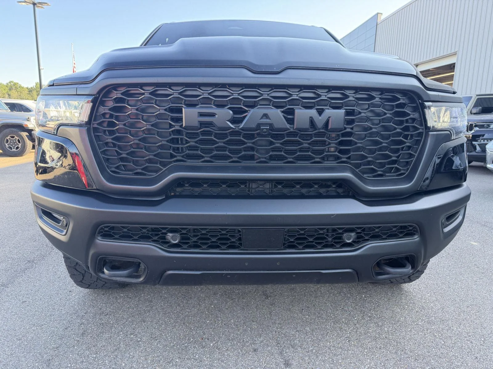 Used 2025 Diamond Black Crystal Pearlcoat Ram Rebel image 25