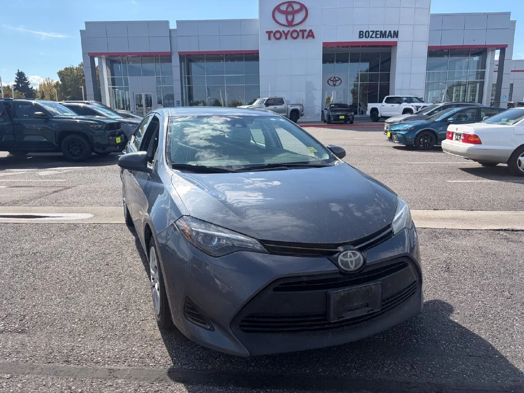 Used 2018 Gray Toyota LE image 1