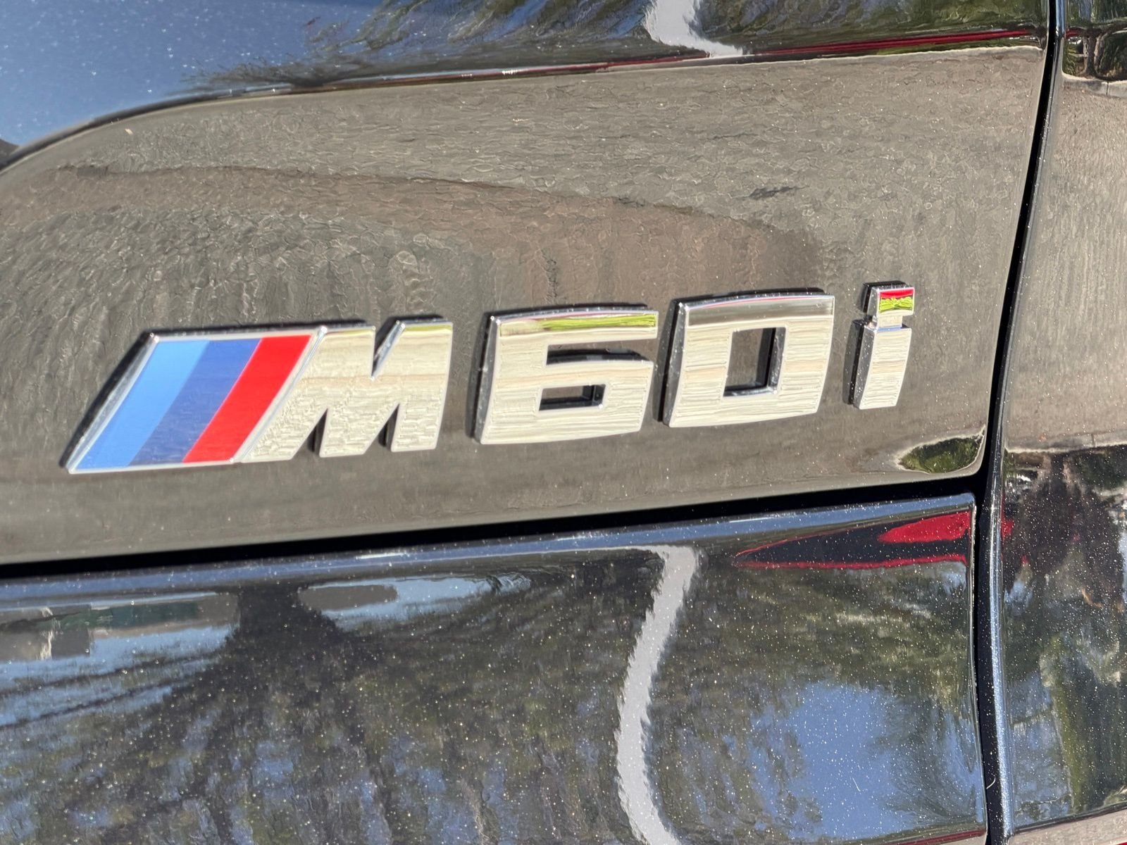 Used 2026 Black Sapphire Metallic BMW M60i image 16