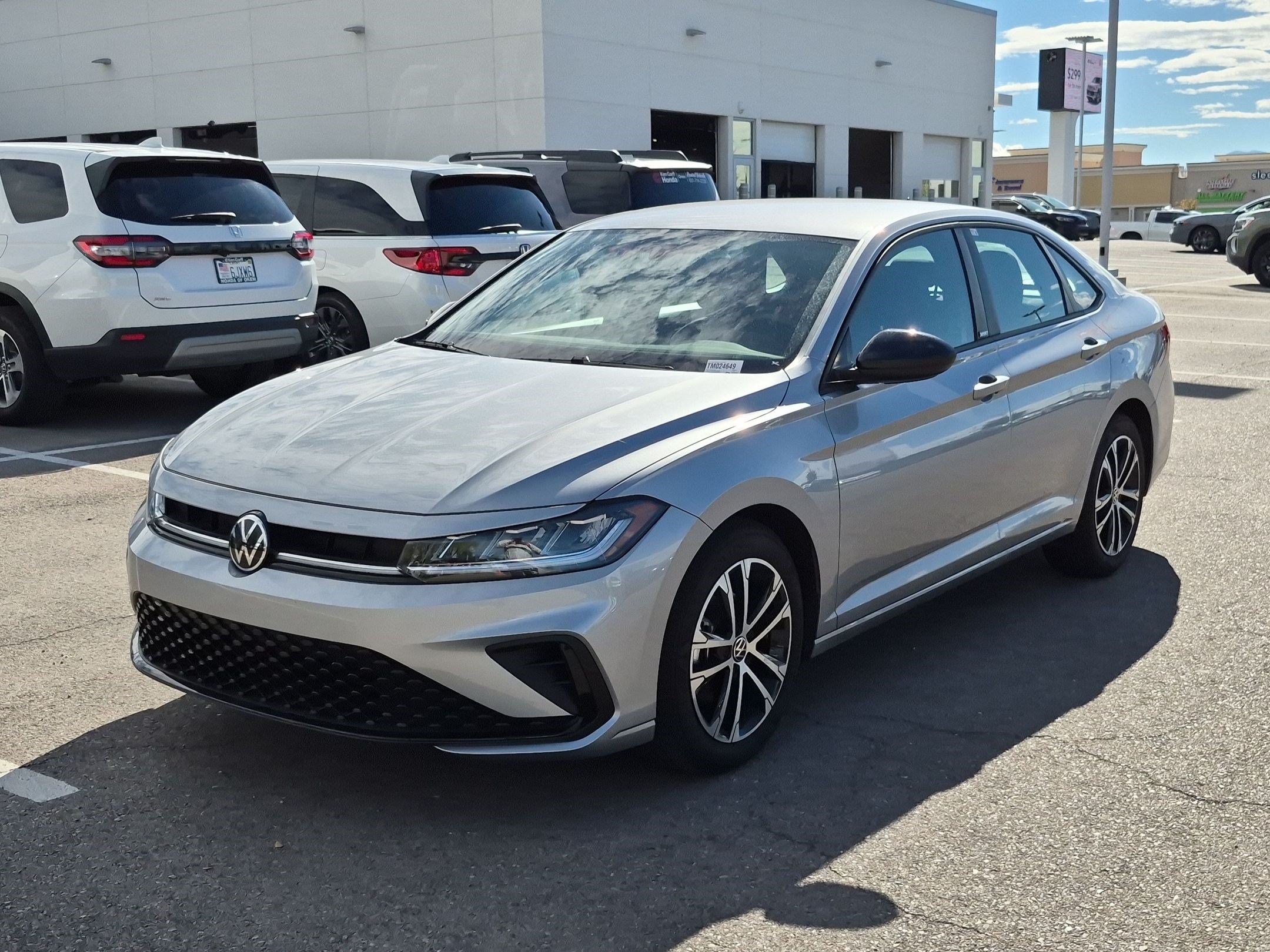 New 2026 Pyrite Silver Metallic Volkswagen Sport image 8