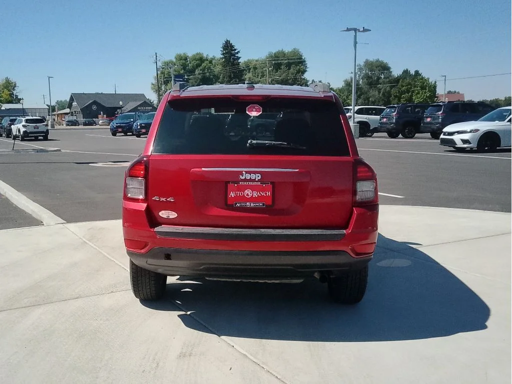 Used 2016 Deep Cherry Red Crystal Pearlcoat Jeep Sport image 4