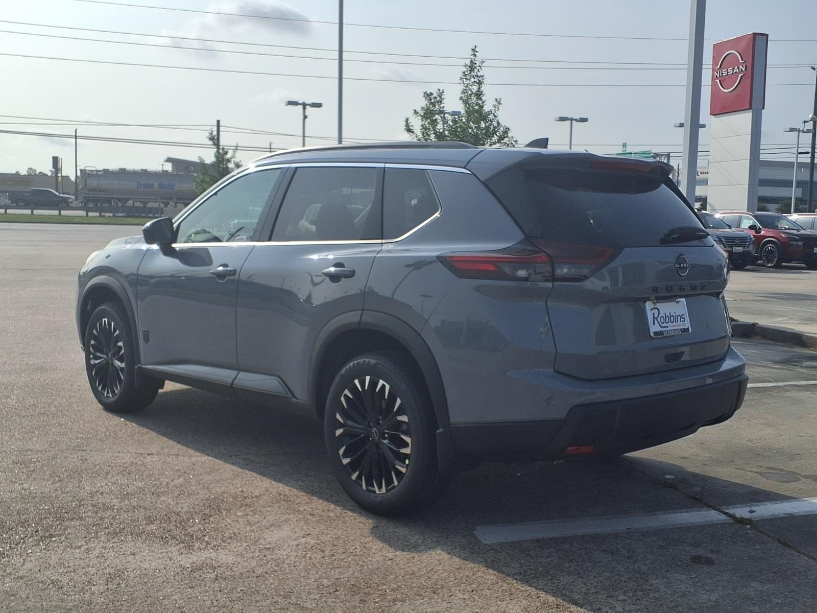 New 2026 Boulder Gray Pearl Nissan Dark Armor image 4