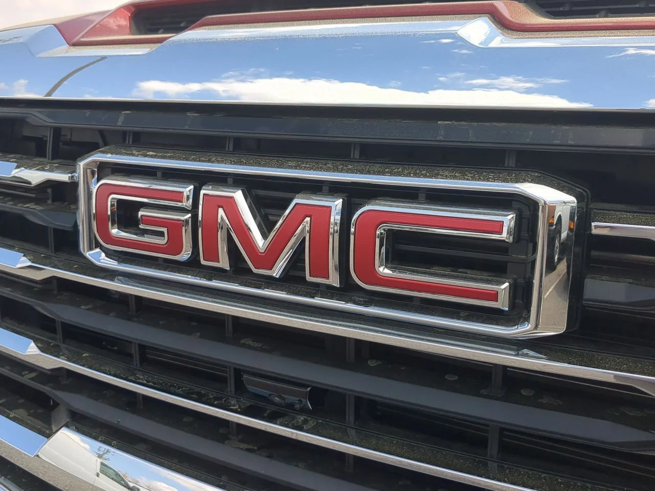 New 2026 Volcanic Red Tintcoat GMC SLT image 32