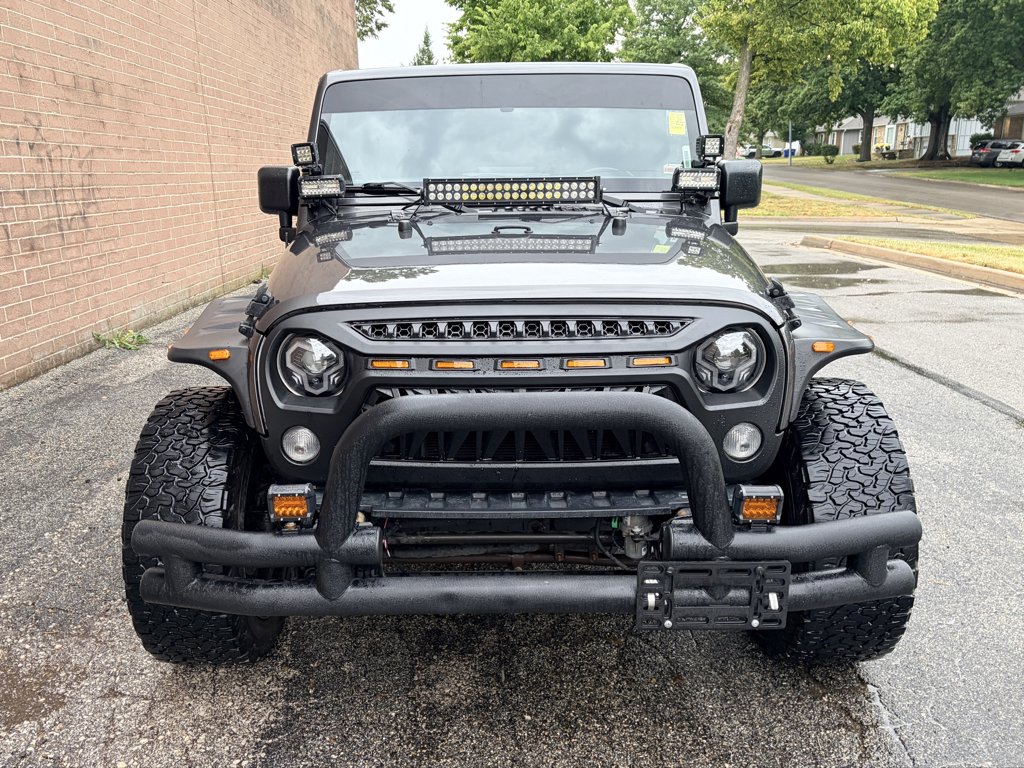 Used 2017 Granite Crystal Metallic Clearcoat Jeep Sport image 8