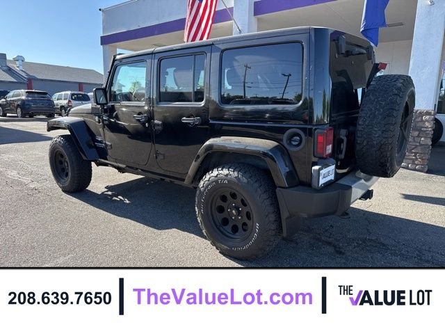 Used 2011 Black Jeep Unlimited Sahara image 6