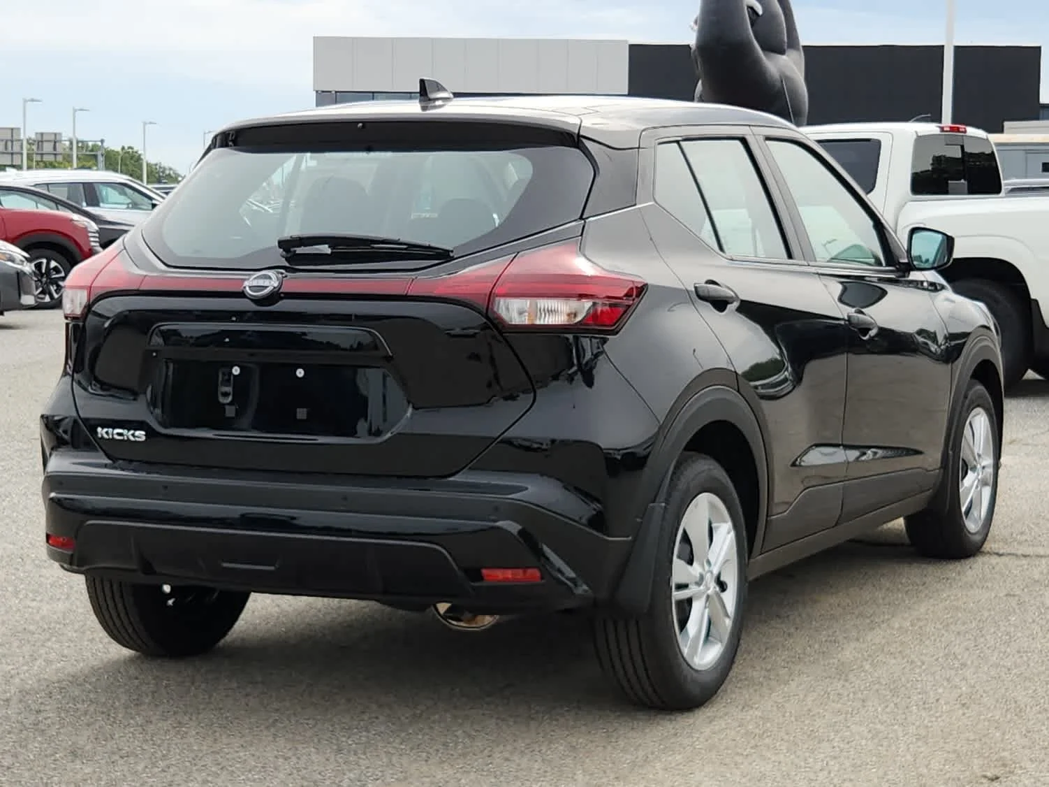 Certified Used 2025 Super Black Nissan S image 3