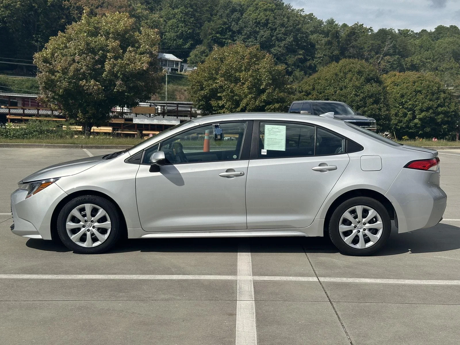 Used 2023 Classic Silver Metallic Toyota LE image 4