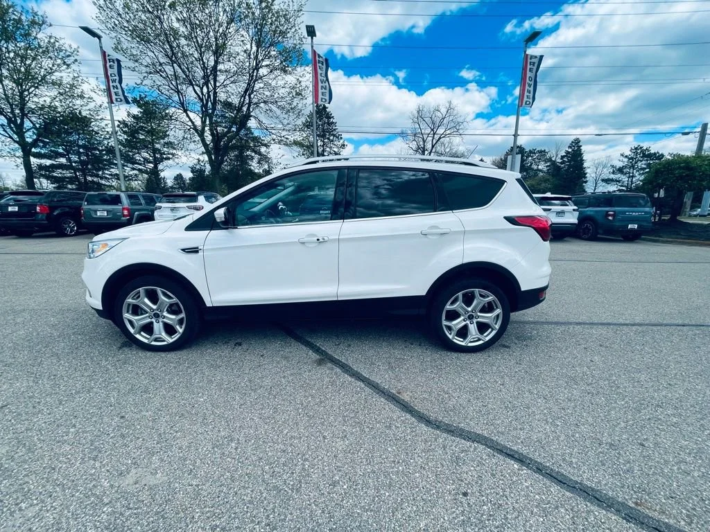 Used 2019 Ford Escape Titanium with VIN 1FMCU9J9XKUC01401 for sale in Howell, MI