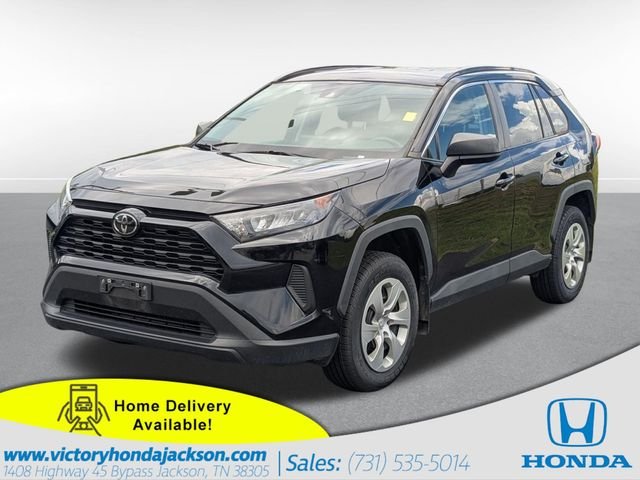 Used 2021 Midnight Black Metallic Toyota LE image 1