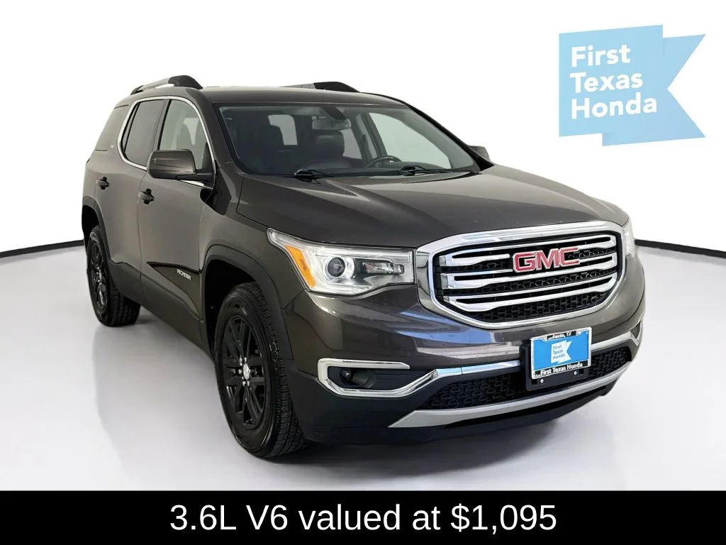 Used 2019 Smokey Quartz Metallic GMC SLT-1 image 1