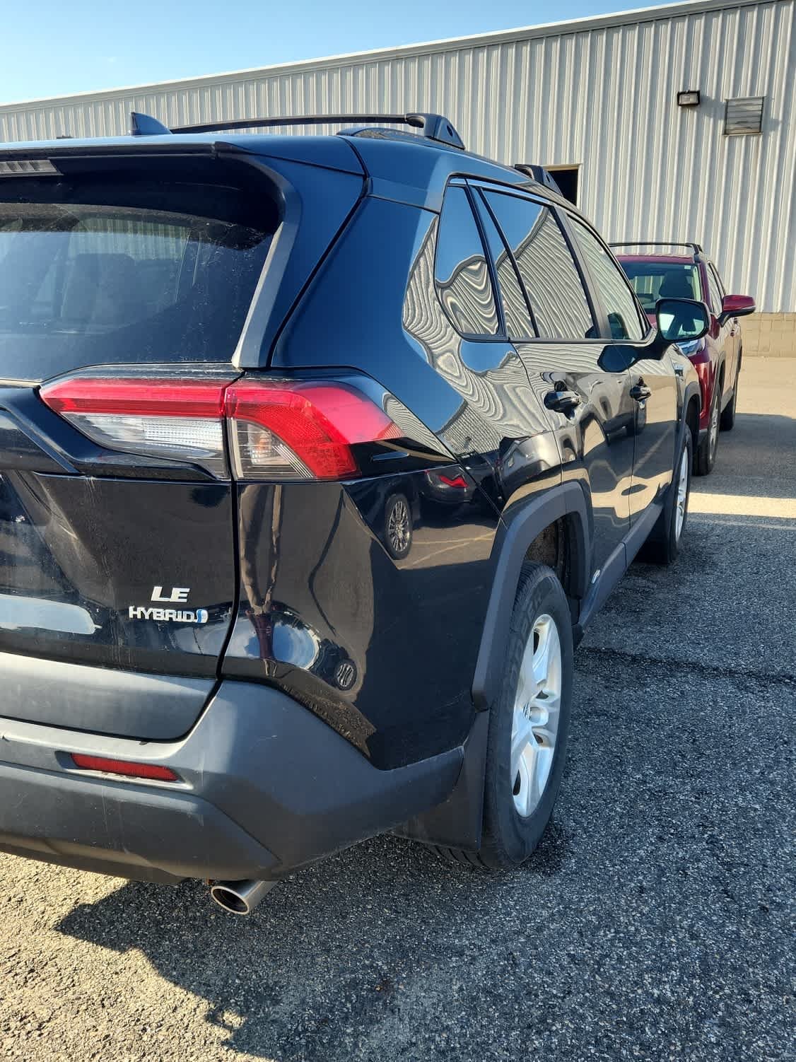 Used 2021 Midnight Black Metallic Toyota Hybrid LE image 3