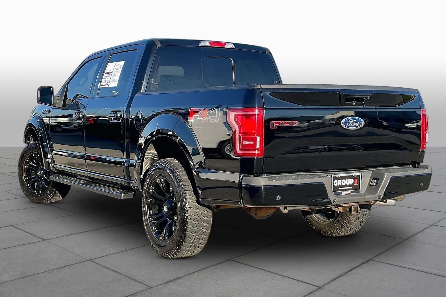 Used 2017 Shadow Black Ford Lariat image 12