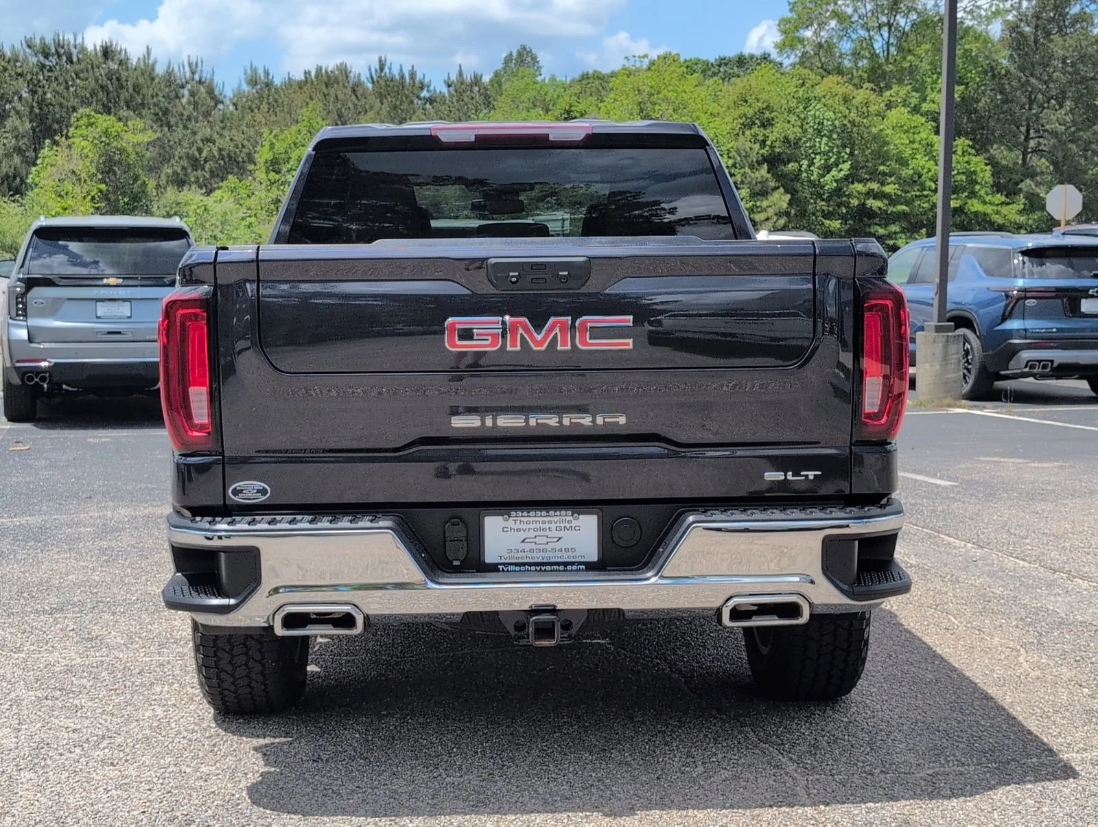 Used 2023 Titanium Rush Metallic GMC SLT image 4